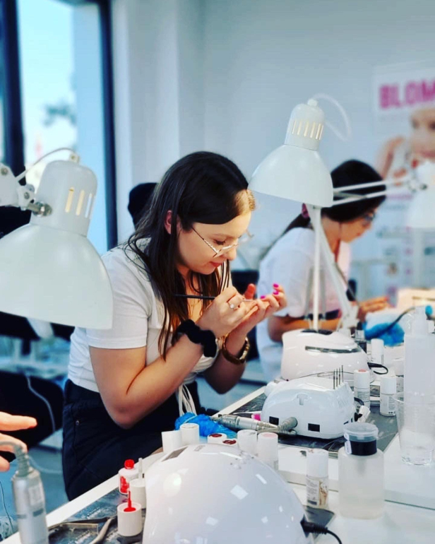 Hands-on hybrid manicure training and professional natural nail preparation techniques.
