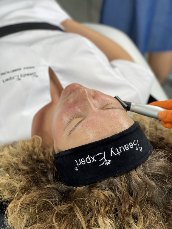 Hands-on facial treatment training covering skin analysis and customized skincare procedures.