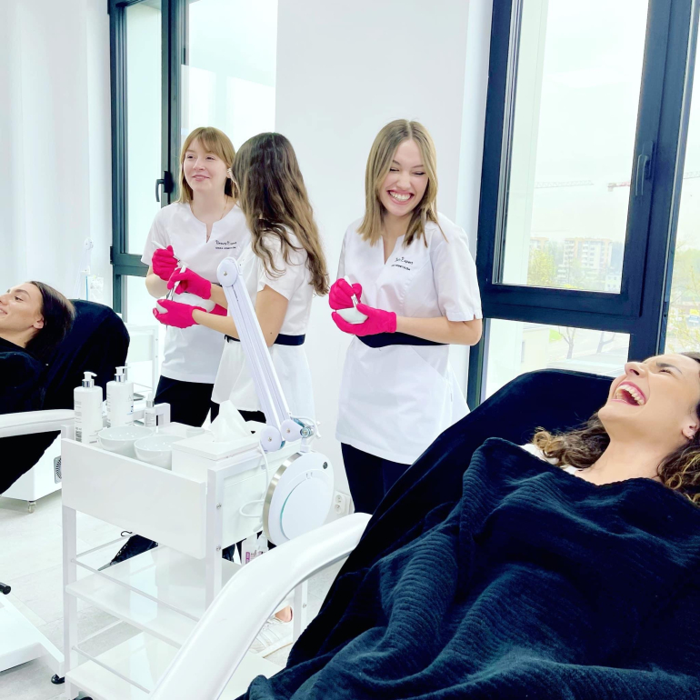 Hands-on training in a professional cosmetology school preparing students for beauty careers.