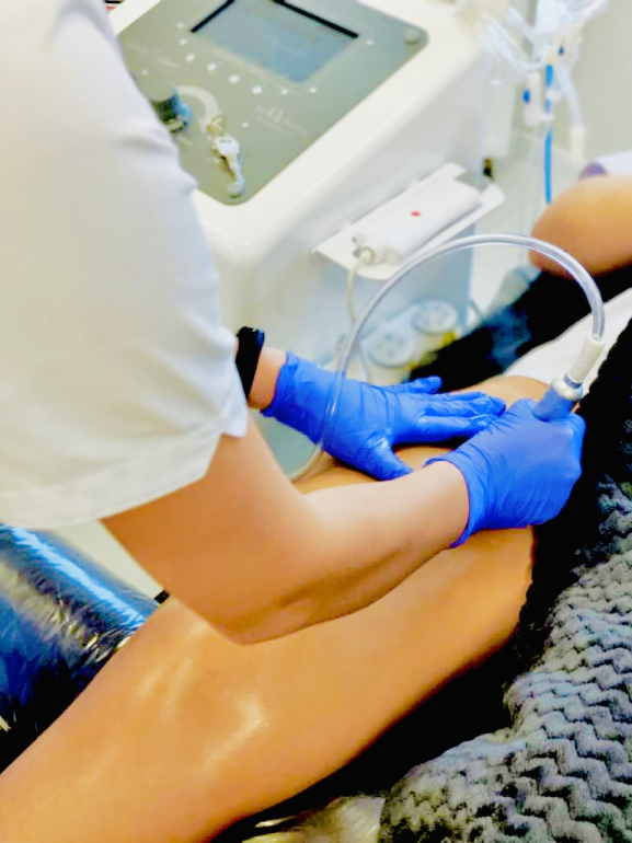 Body contouring training using vacuum therapy, dermomassage, and electrical muscle stimulation (EMS).