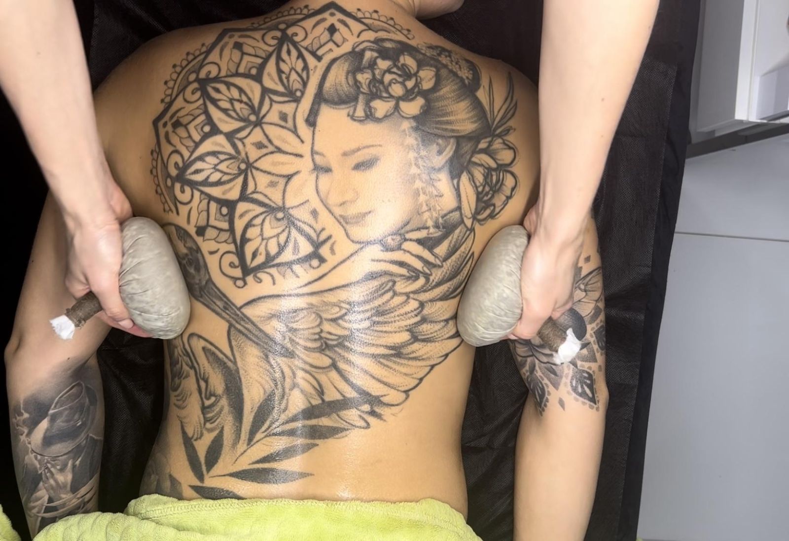 matcha herbal compress prepared for massage treatment